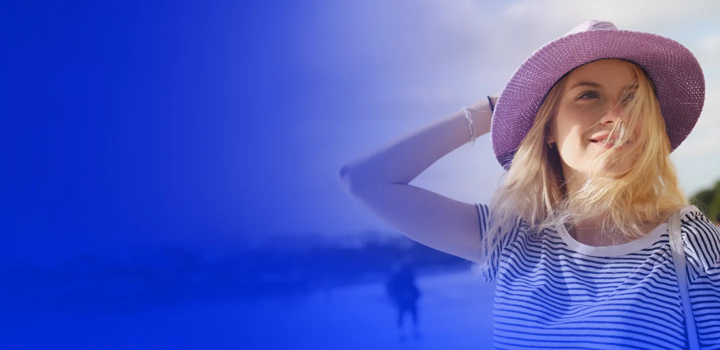 A woman in a pink hat