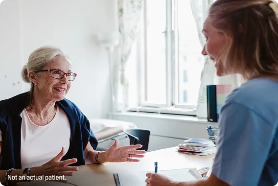 A woman talking with her doctor